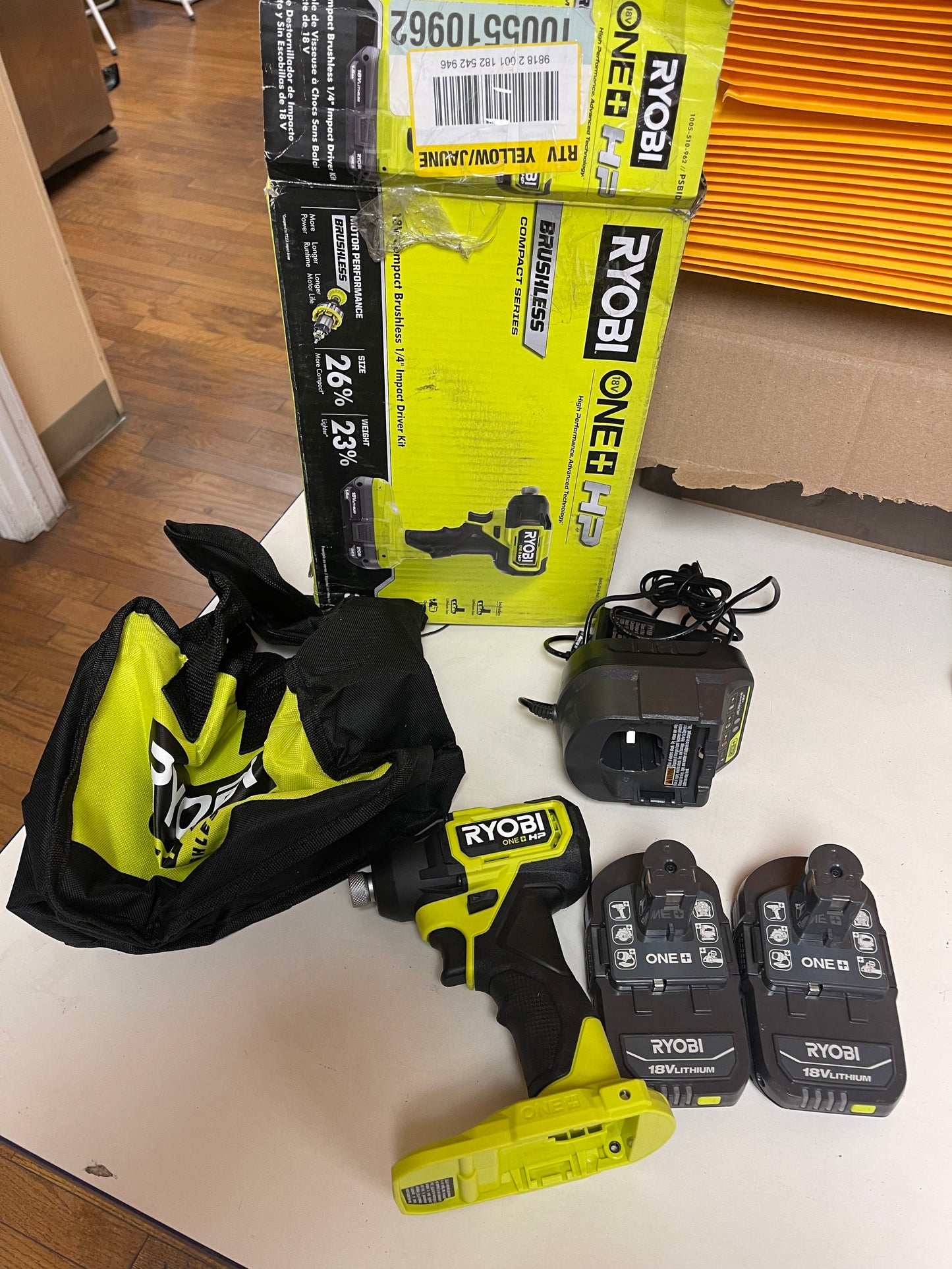 Ryobi One Plus HP 18V Brushless Cordless Compact 1/4in Impact Driver Kit With 2 1.5 Ah Batteries Charger And Bag Damaged Box